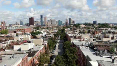 Rising-aerial-reveals-neighborhood-community-homes-in-urban-Baltimore-Maryland-USA