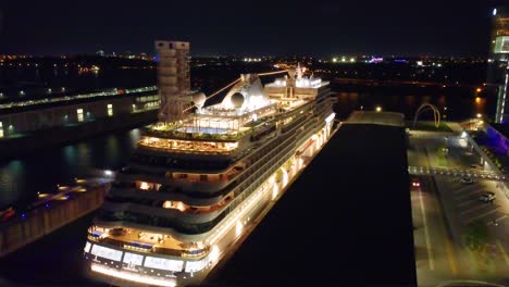 cruise ship docked at night
