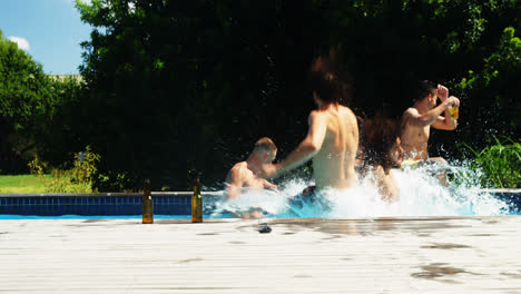 friends jumping in the swimming pool