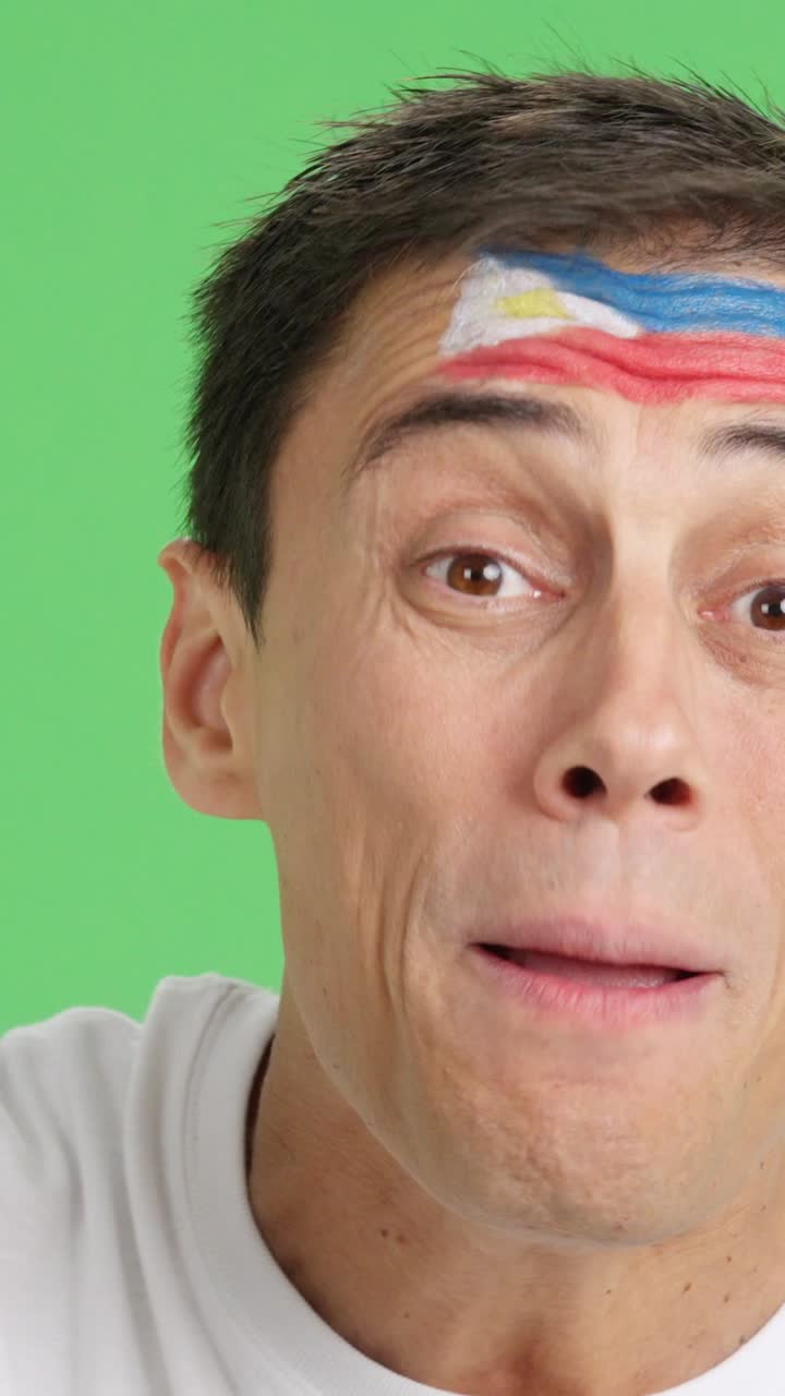 Very nervous man supporting philippine team during a difficult match