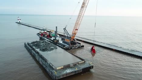 Dredging-operation-in-Kewaunee-Harbor-on-Lake-Michigan,-Kewaunee,-Wisconsin-16