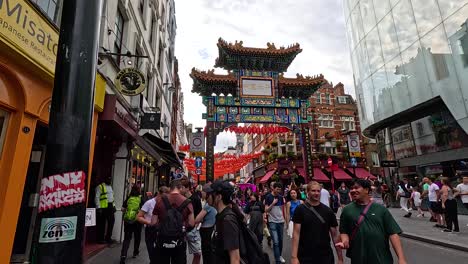 people walking in chinatown, london