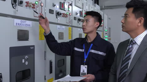 data center specialist: cyber security people in server racks room, database or software update with network inspection, technician or system admin.