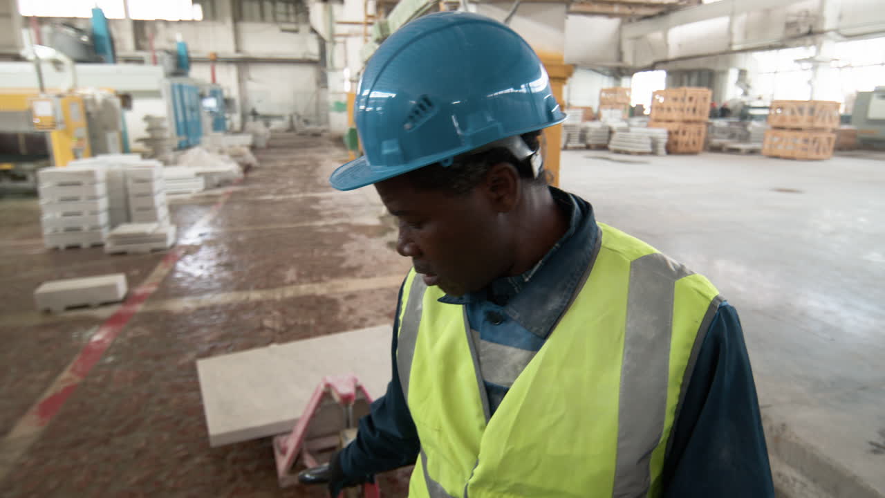 Man transporting marble piece
