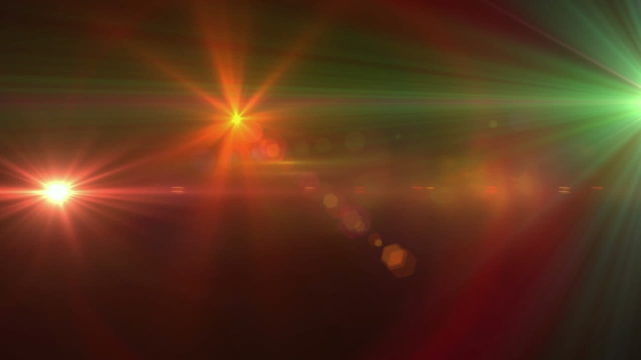 animación digital de múltiples puntos de luz coloridos que se mueven contra un fondo oscuro