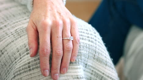 commitment, wedding ring and support with hands