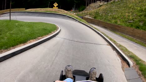 ride a luge down the mountain in queenstown new zealand