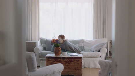 beautiful-woman-dancing-at-home-practicing-ballet-dance-moves-having-fun-rehearsing-in-living-room