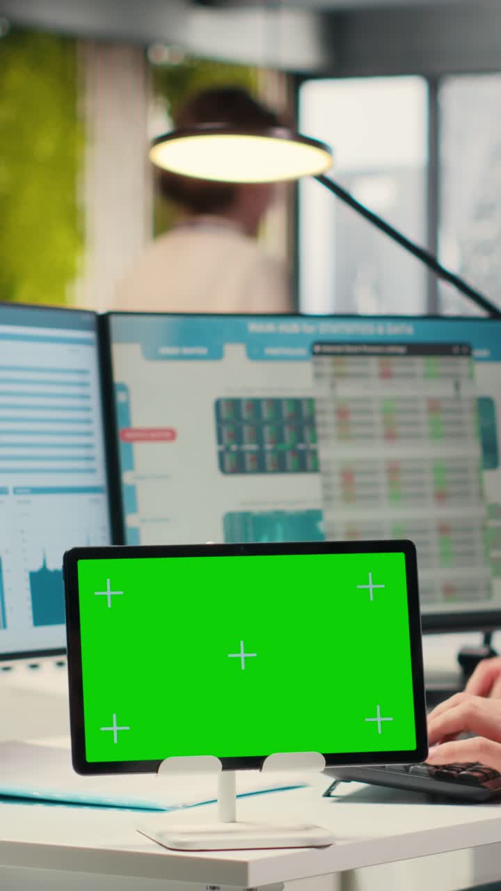 Vertical Video Professional male analyst examining KPI insights with mockup on tablet