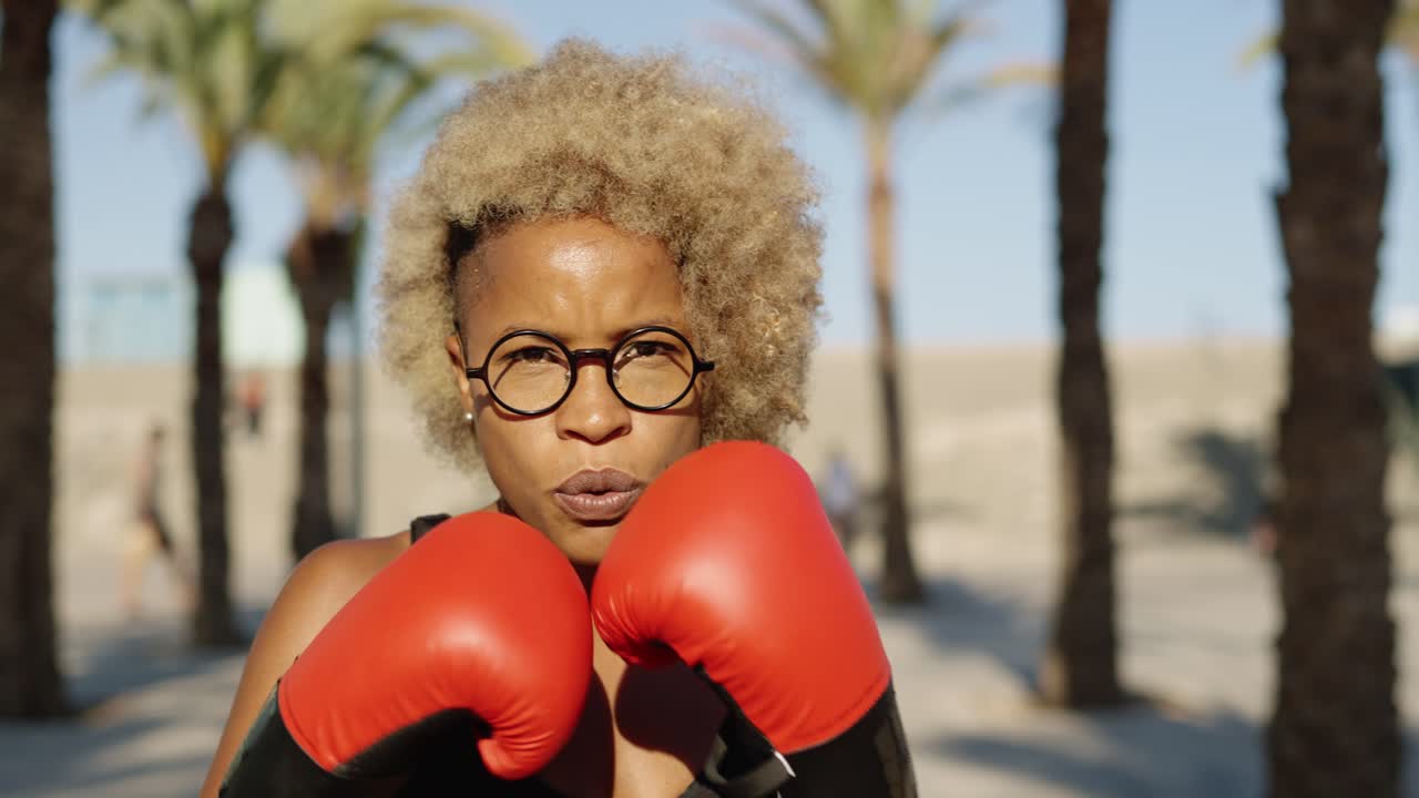 Woman boxing outdoors