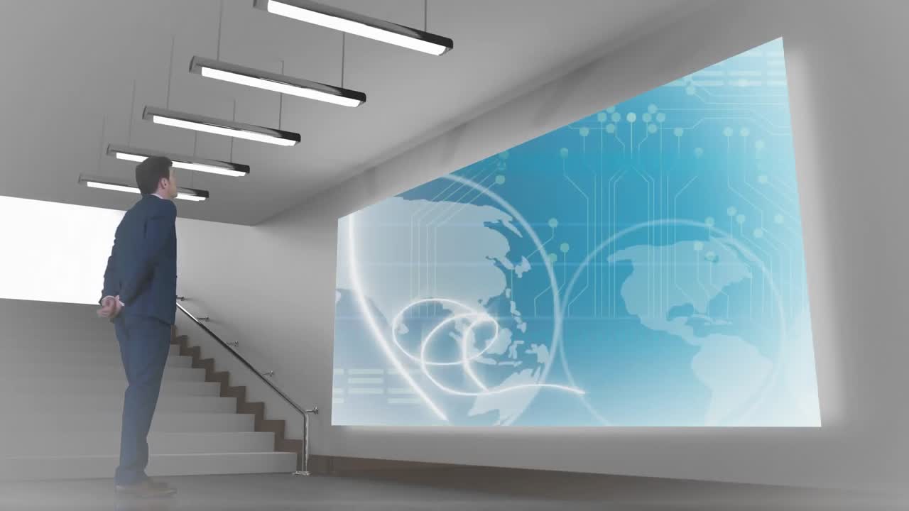 남자가 lcd에서 비디오를 보고 있습니다.