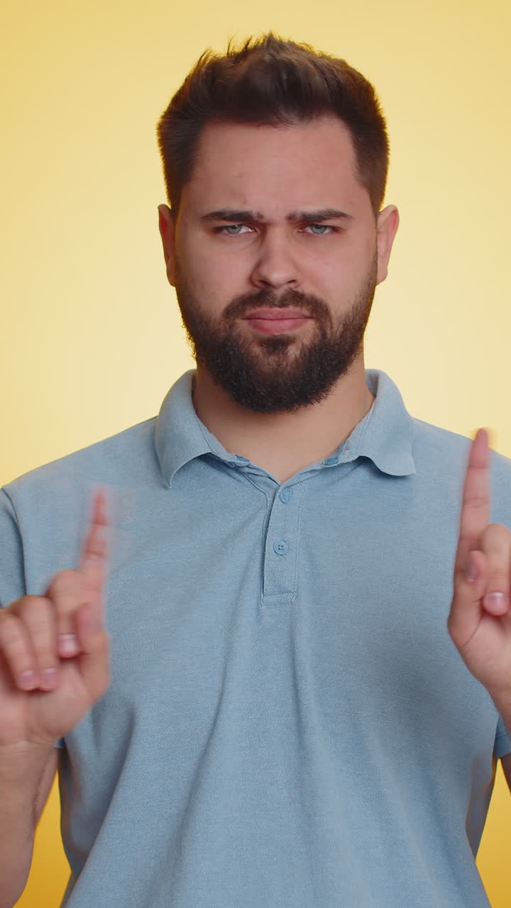 Confused displeased surprised caucasian man pointing fingers hisself rejection refusal stop sign