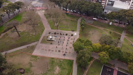 Group-of-ninja-practicing-martial-arts-at-park,-Buenos-Aires