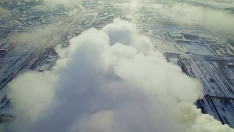 industrial area covered in winter fog and smoke