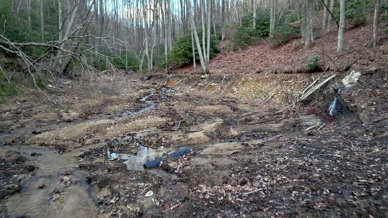 earthen dam break during hurricane helene near boone nc, north carolina