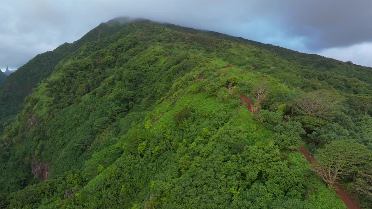 Trail Vallee de Tautira Bay River North Shore Taiarapu Taravao Tahiti island French Polynesia aerial drone golden morning sunrise valley Vaitia village neighborhood Teahupo forward up mountain motion