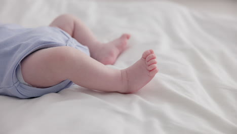 Adorable,-family-and-feet-of-baby-on-bed-for-child