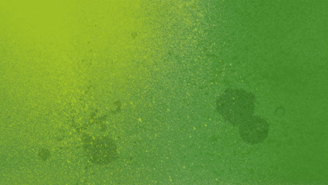 vibrant green and yellow paint splashes on background