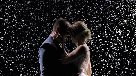 couple embracing in snow