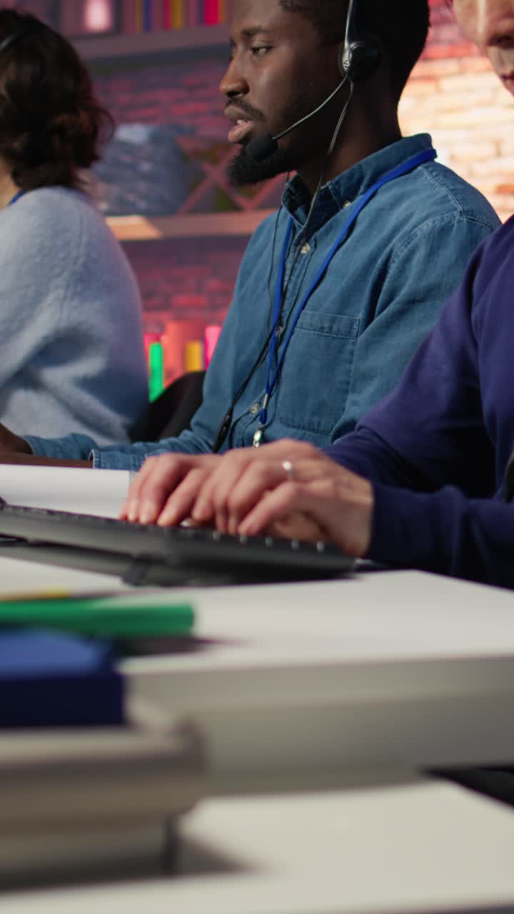 Vertical video Call center agent helps customers regain access to accounts, diagnosing problems