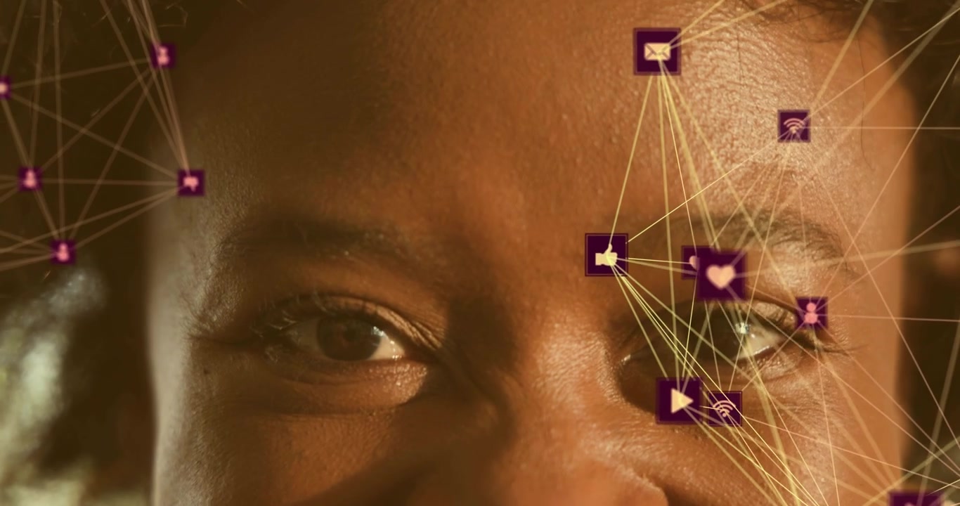 Network nodes appearing on woman's face turning into purple social icons forming network overlay