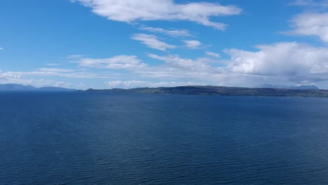 push-down drone tilt shot of ocean view