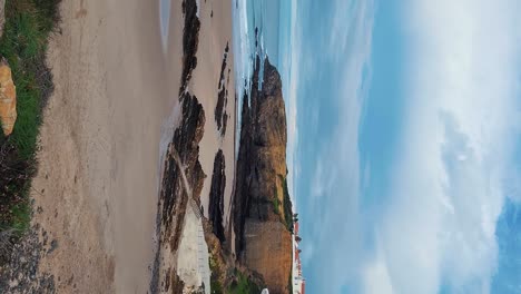 the almograve beach with black basalt rocks in alentejo coast, portugal