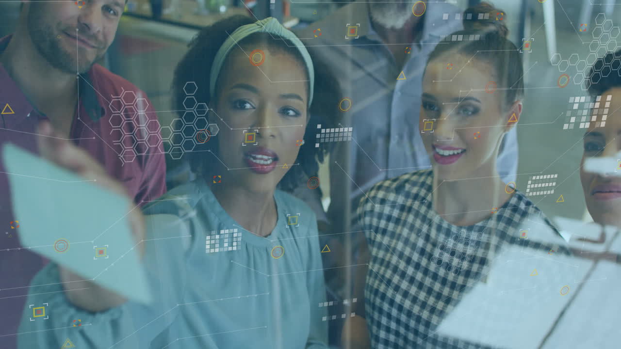 Collaborating with digital data, diverse team in office using animation overlay