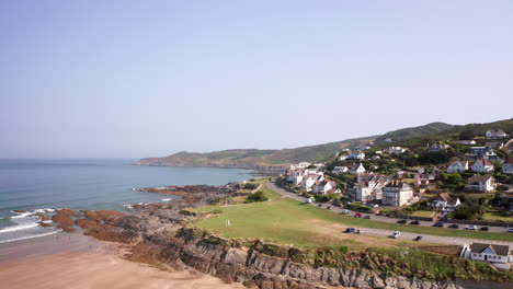 aerial flyover of the green - esplanade in north devon