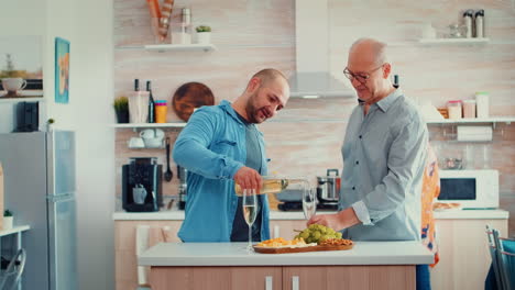 Son-pouring-wine-in-father's-glass