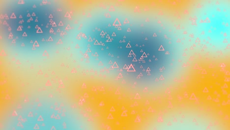 tema geométrico abstracto con partículas de triángulo relucientes sobre un fondo desenfocado colorido.