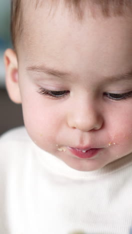baby eating with spoon