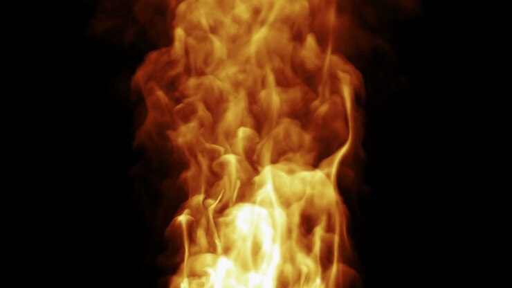 Design a fuoco su sfondo nero. Dimensioni 4K, loopabile.