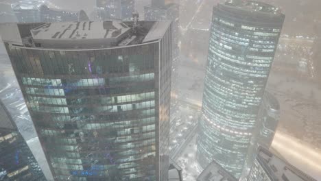 snowy cityscape at night