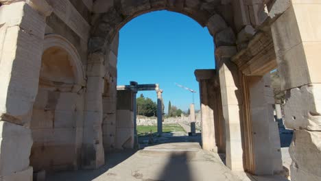 dolly shot through the left arch of the gate of mazeus and mithridates in the ancient city ephesus