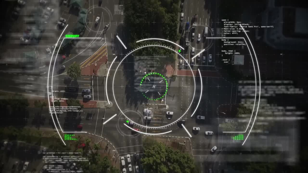 Animation of circles and computer language over aerial view of moving vehicles on street