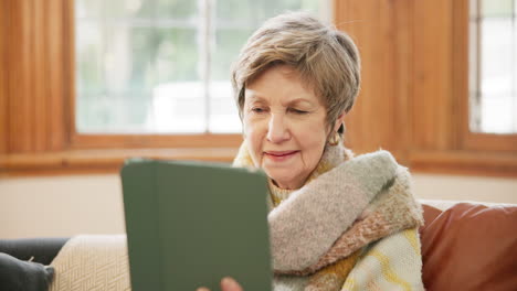 Home,-video-call-and-elderly-woman-with-a-tablet