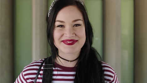 young-gritty-woman-student-portrait-smiling-confident-wearing-stripe-shirt