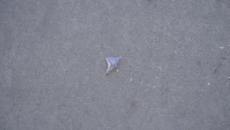 Top-Down-Slow-Motion-of-Brown-Ceramic-Mug-Smashing-on-Concrete