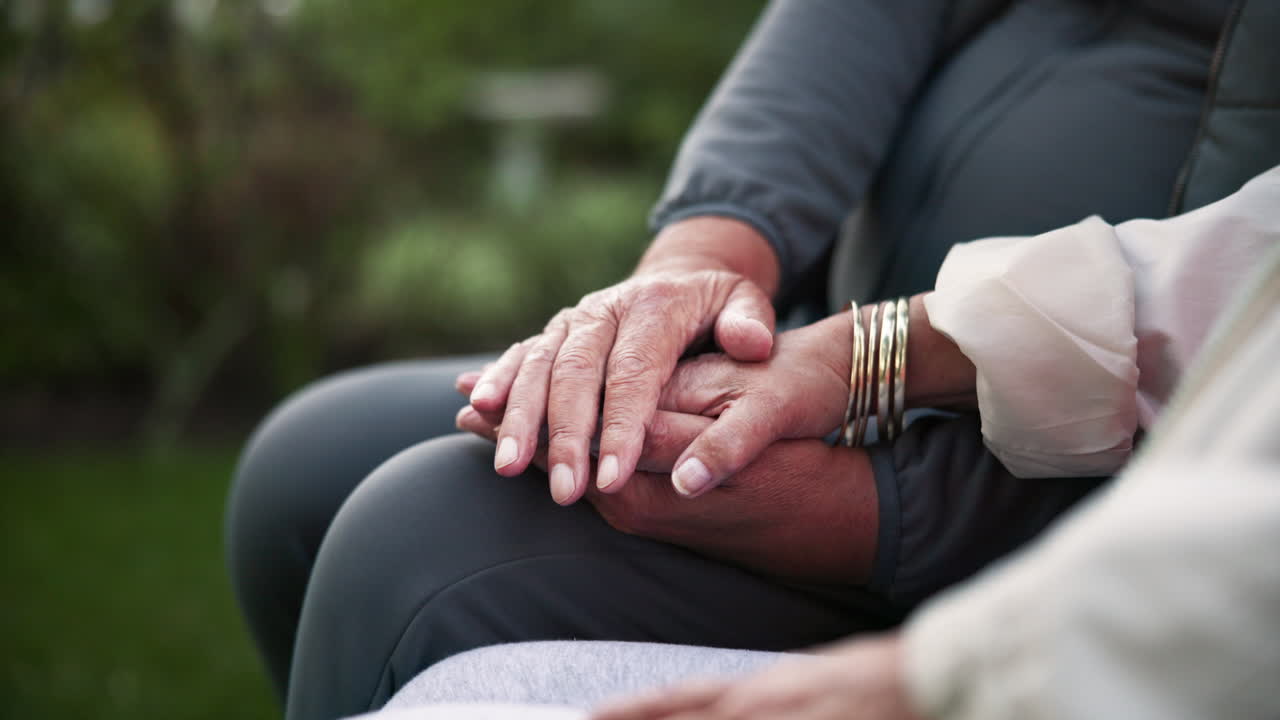 Elderly hands showing love and affection