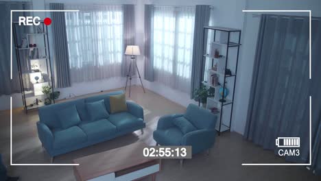 monitor scherm opnemen van een dief met een zaklamp stelen van een televisie in iemands huis voordat ze weglopen