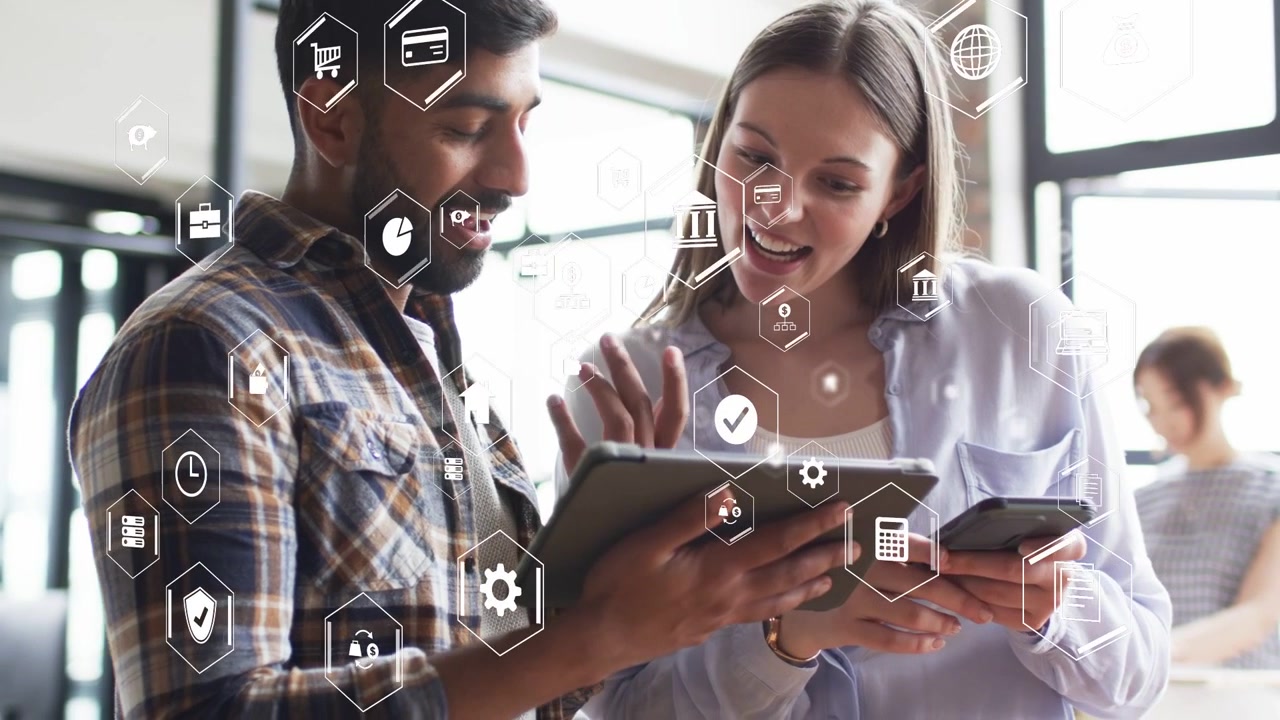 Man tapping tablet and woman pointing, initiating hex UI overlay and cross-checking finance chart