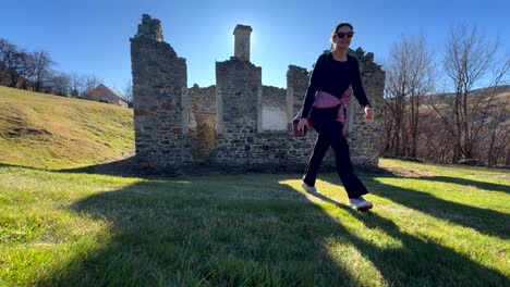 ruins of a stone building with a person