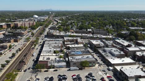 aerial view of a suburb with city skyline in the background