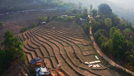 Stepped-dry-rice-plantation-terraces-in-Thailand-after-harvest