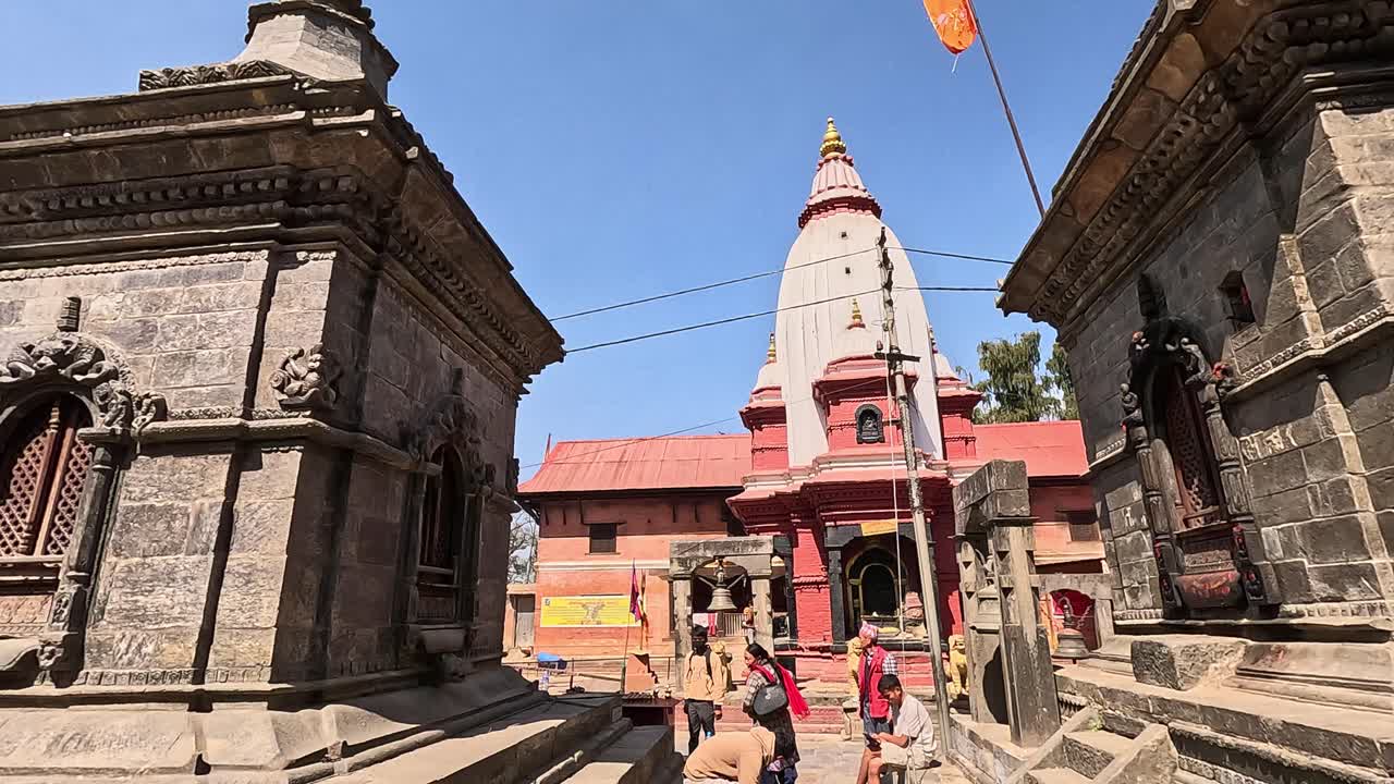 Pashupatinath Temple Shivalayas at Mrigasthali Mausoleums under Trees and blue sky. Kathmandu, Nepal