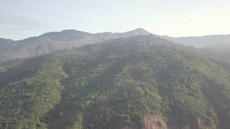 The-famous-Golden-Rock-Pagoda-in-central-Myanmar,-One-of-the-top-3-famous-pilgrimage-sites-for-the-Burmese-people,-to-come-and-pay-their-respects-for-buddha