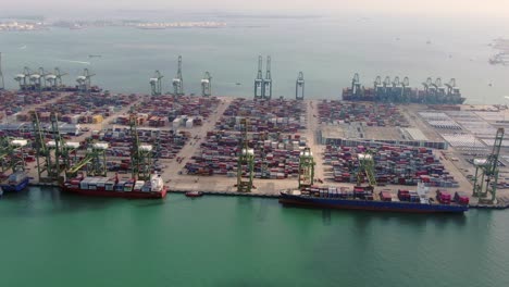 aerial footage of commercial port terminal in singapore