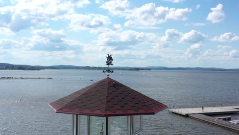 lakefront marina view with sailing boats