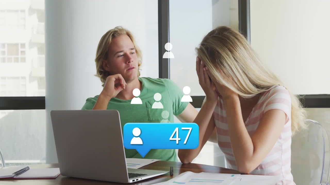 man leaning back resting chin, woman covering face reviewing marketing charts with follower icons